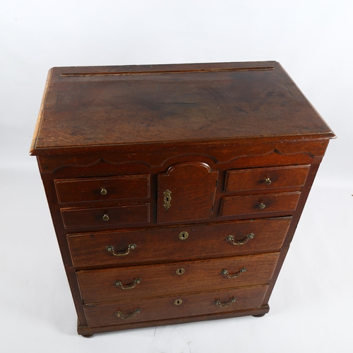 234 - 18th century oak chest of drawers of small size, with central alcove arch-top cupboard, width 79cm, ... 