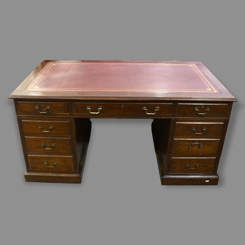 236 - A mahogany pedestal desk, circa 1900 - 1910, with drawer-fitted pedestals, 152cm x 84cm (5' x 2'9