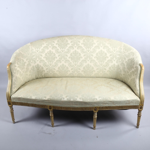 237 - A French salon sofa with carved giltwood frame, on 8 legs, length 147cm (4'10