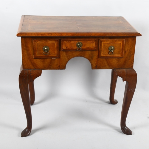 253 - An 18th century crossbanded lowboy with 3 frieze drawers, 73cm x 49cm, height 71cm