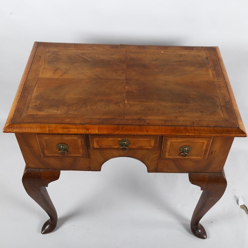 253 - An 18th century crossbanded lowboy with 3 frieze drawers, 73cm x 49cm, height 71cm