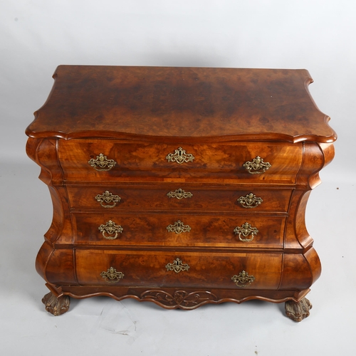 255 - A Continental burr-walnut bombe chest of 4 long drawers, probably mid-20th century, width 94cm, dept... 