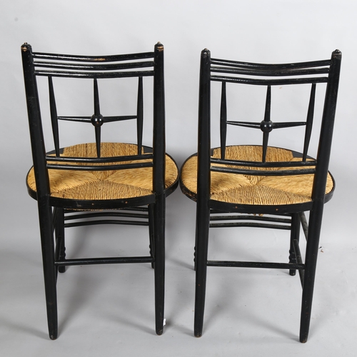 257 - A pair of Morris & Company, Arts and Crafts chairs by Ford Maddox Brown, ebonised frame with rush se... 