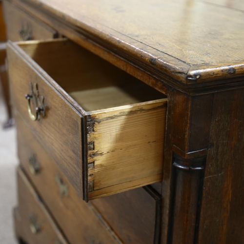 302 - An 18th century oak chest of 3 long and 2 short drawers, with corner columns, width 100cm, depth 54c... 