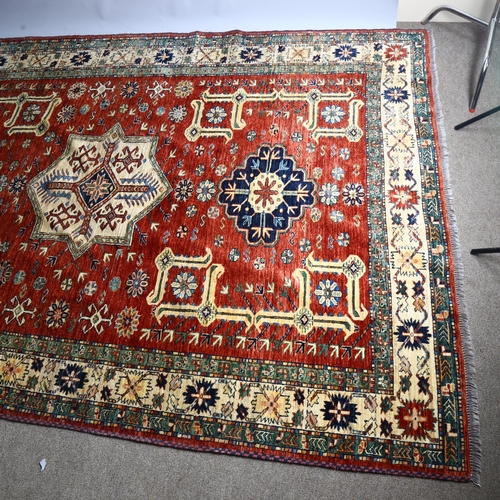 192 - A large Royal Afghan carpet, circa 1980s', approx 300 x 200cm