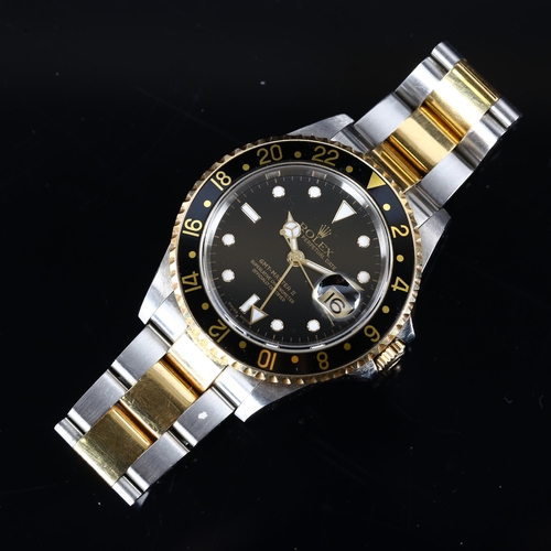 1000 - ROLEX - a bi-metal GMT Master II Oyster Perpetual Date automatic bracelet watch, ref. 16713, circa 2... 
