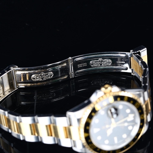 1000 - ROLEX - a bi-metal GMT Master II Oyster Perpetual Date automatic bracelet watch, ref. 16713, circa 2... 