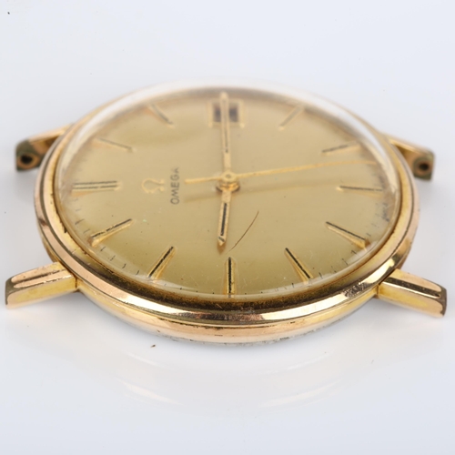 1009 - OMEGA - a gold plated stainless steel mechanical wristwatch head, champagne dial with gilt baton hou... 