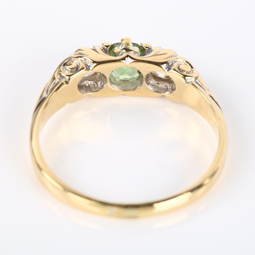 1053 - A 19th century three stone demantoid garnet and diamond half hoop ring, unmarked gold settings with ... 