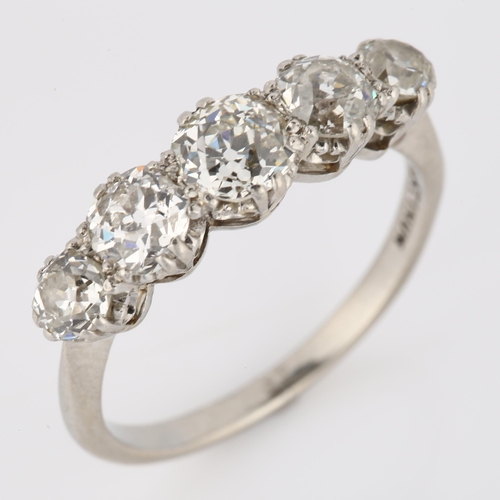 1058 - A platinum five stone diamond ring, set with old European-cut diamonds 1.4ct, colour approx H-J, cla... 