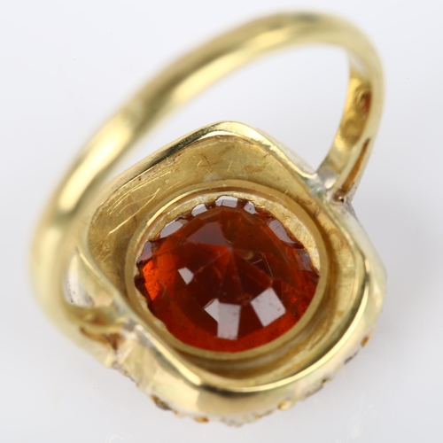 1062 - An 18ct gold hessonite garnet and diamond cluster ring, set with cushion-cut garnet and rose-cut dia... 