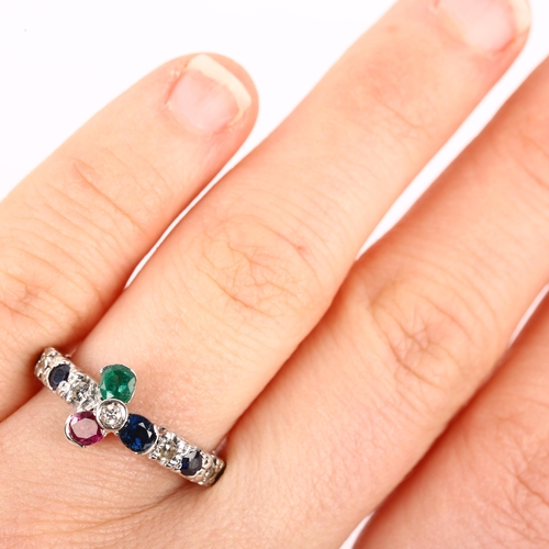 1066 - An 18ct white gold gem set flowerhead ring, gemstones include ruby sapphire emerald and diamond, set... 