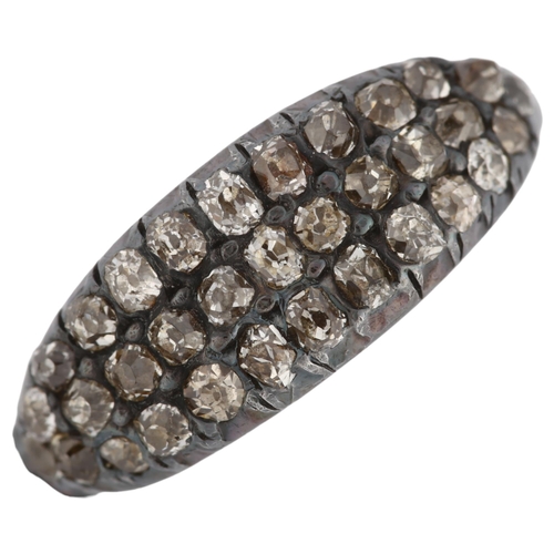 1067 - A Victorian diamond cluster ring, unmarked gold and silver settings, pave set with old-cut diamonds,... 