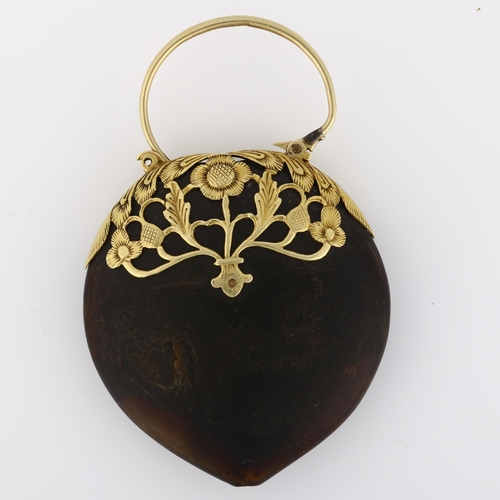 1074 - A 17th century gold-mounted tortoiseshell heart padlock charm, openwork floral design, overall heigh... 