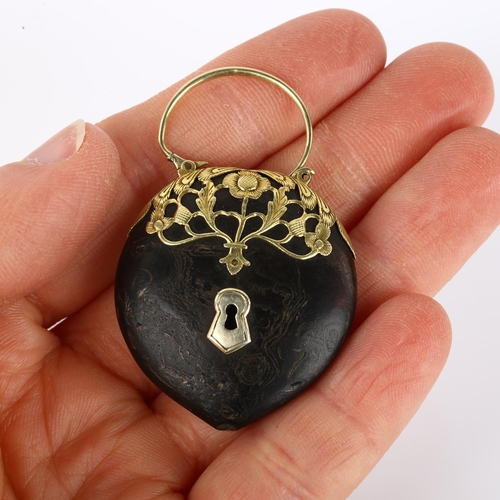 1074 - A 17th century gold-mounted tortoiseshell heart padlock charm, openwork floral design, overall heigh... 