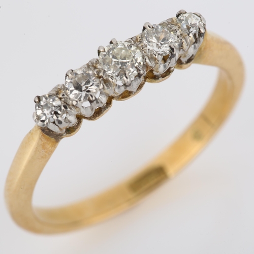 1092 - An 18ct gold graduated five stone diamond ring, set with old European-cut diamonds, total diamond co... 