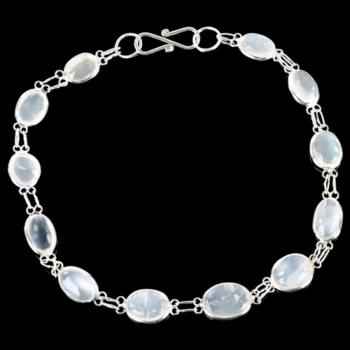 1234 - A modern silver moonstone line bracelet, set with oval cabochon moonstone, bracelet length 18cm, 4g