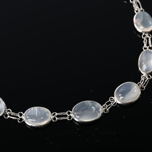 1234 - A modern silver moonstone line bracelet, set with oval cabochon moonstone, bracelet length 18cm, 4g