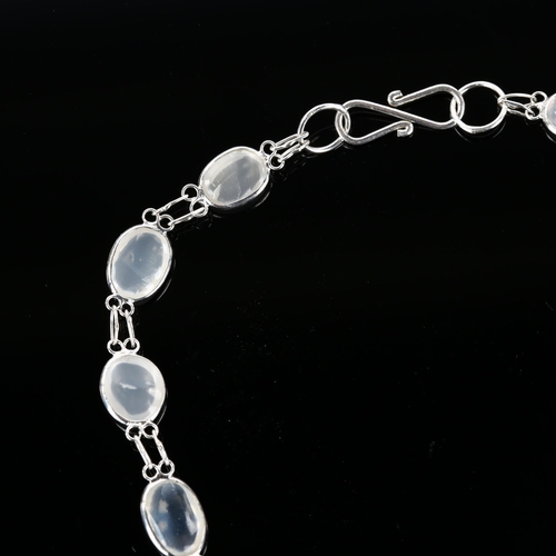 1234 - A modern silver moonstone line bracelet, set with oval cabochon moonstone, bracelet length 18cm, 4g