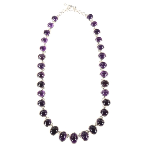 1235 - A large modern silver graduated amethyst fringe necklace, set with oval cabochon amethyst, necklace ... 