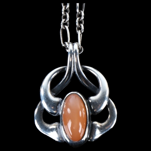 1244 - GEORG JENSEN - a Danish modernist sterling silver and orange moonstone pendant necklace of the year ... 