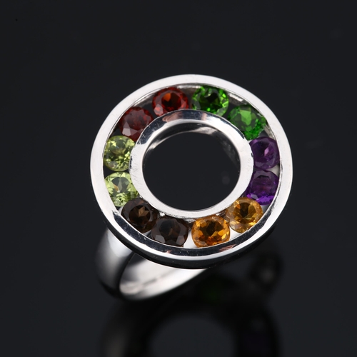 1245 - A modern sterling silver gem set halo ring, gemstones include amethyst citrine smoky quartz etc, set... 