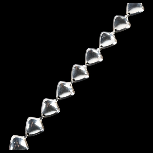 1254 - HERMANN SIERSBOL - a Danish modernist sterling silver Delta wing line necklace, length 43cm, 29.3g