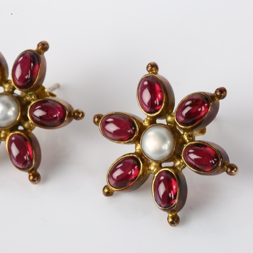 1261 - A pair of silver-gilt garnet and pearl ship's wheel earrings, earring diameter 23.8mm, 7.3g