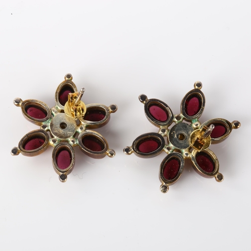 1261 - A pair of silver-gilt garnet and pearl ship's wheel earrings, earring diameter 23.8mm, 7.3g