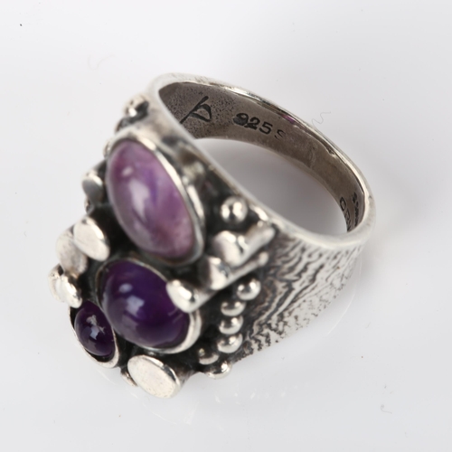 1264 - A Norwegian brutalist sterling silver and amethyst ring, set with oval and round cabochon amethyst, ... 