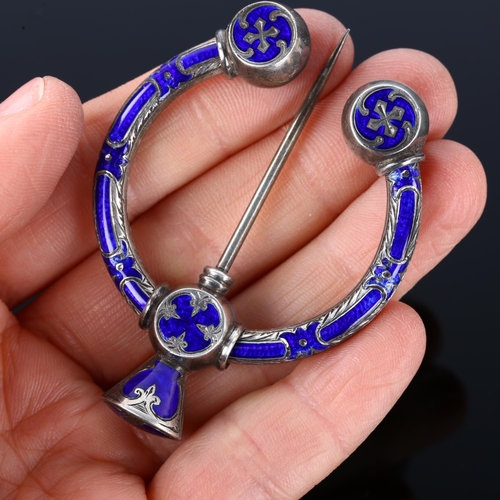 1275 - A 19th century Scottish Celtic blue enamel penannular brooch, unmarked silver settings with allover ... 