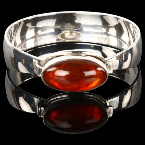 1290 - NIELS ERIK FROM - a Danish modernist sterling silver and amber bracelet, setting height 18.4mm, inte... 