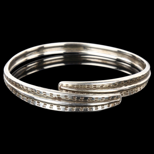 1291 - DAVID ANDERSEN - a Norwegian sterling silver leaf bangle, band width 10.8mm, internal circumference ... 