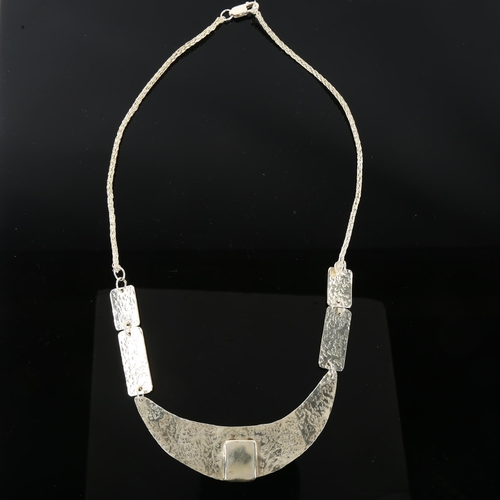 1299 - A handmade sterling silver collar necklace, by Claude Wilkes, hallmarks London 2016, necklace length... 