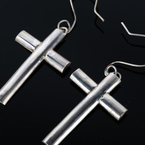 1301 - A pair of cross drop earrings, by Claude Wilkes, earring height 63.8mm, 12.9g