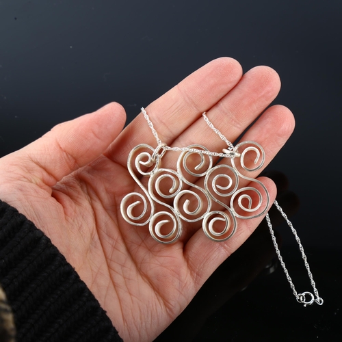 1305 - A handmade sterling silver spiral pendant necklace, by Claude Wilkes, hallmarks London 2019, pendant... 