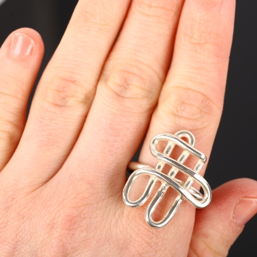 1306 - A handmade sterling silver abstract ring, by Claude Wilkes, hallmarks London 2015, setting height 28... 