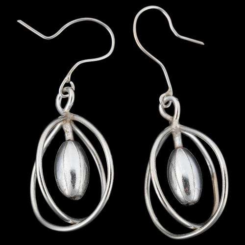 1307 - A pair of sterling silver cage drop earrings, by Claude Wilkes, earring height 56.3mm, 11g