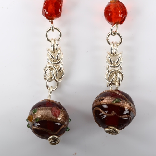 1311 - A pair of handmade sterling silver and glass drop earrings, by Claude Wilkes, height 72.9mm, 15.1g