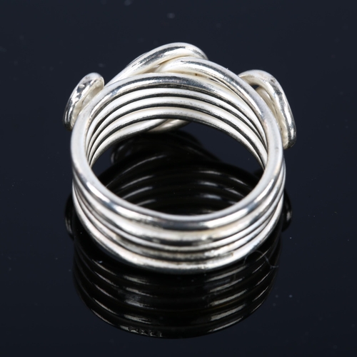 1312 - A handmade sterling silver abstract band ring, with spiral motif, by Claude Wilkes, setting height 1... 