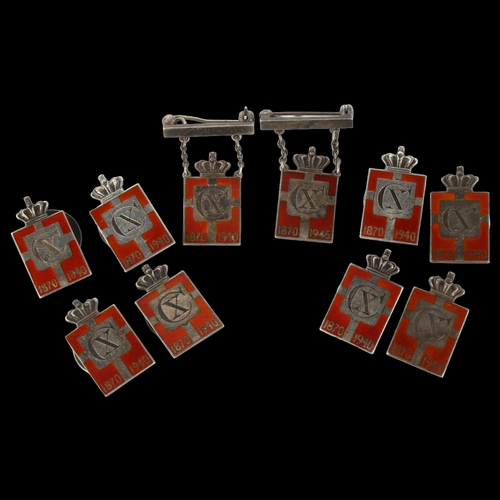 1326 - GEORG JENSEN - 10 Danish sterling silver and red enamel Kingmark badges and brooches, height 23.8mm,... 