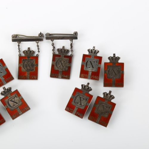 1326 - GEORG JENSEN - 10 Danish sterling silver and red enamel Kingmark badges and brooches, height 23.8mm,... 