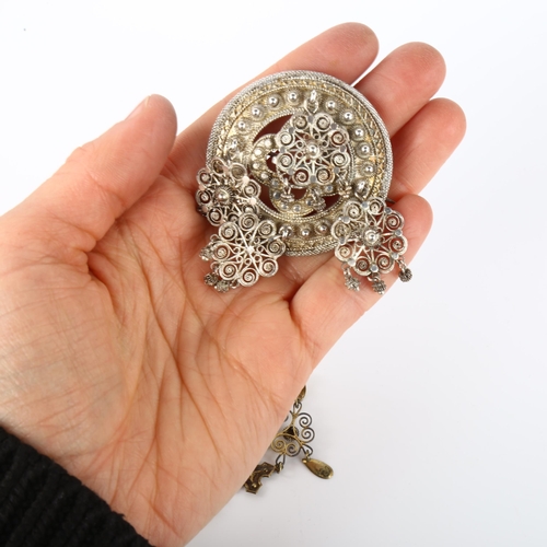 1327 - 6 Scandinavian silver Folk Art brooches, largest diameter 49.7mm, 71.6g total (6)