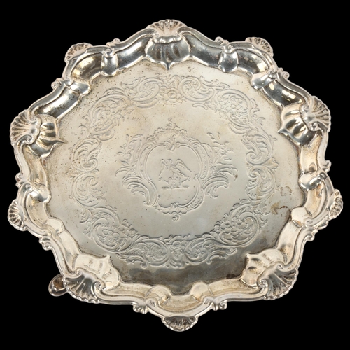 1351 - A George II silver salver, circular form with scalloped shell and foliate border, by Richard Rugg, h... 