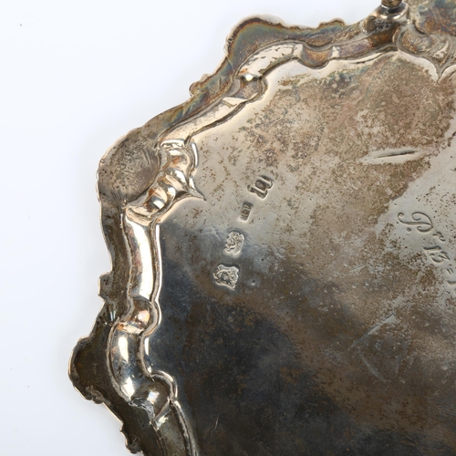 1351 - A George II silver salver, circular form with scalloped shell and foliate border, by Richard Rugg, h... 