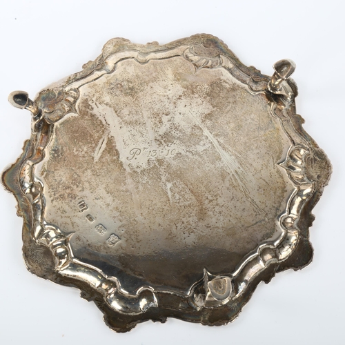 1351 - A George II silver salver, circular form with scalloped shell and foliate border, by Richard Rugg, h... 