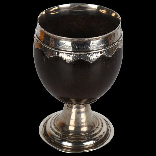 1352 - A 17th/18th century silver-mounted coconut cup, with later engraved inscription dated 1875, height 1... 