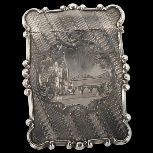 1356 - An Antique unmarked silver card case, allover engine turned decoration with engraved village and lak... 