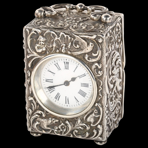 1357 - A Victorian silver boudoir carriage clock, by Mappin Brothers, hallmarks London 1896, allover foliat... 