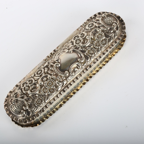 1360 - A late Victorian silver dressing table ring box, with relief embossed foliate lid, indistinct maker'... 